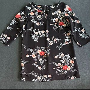 Black mini dress with floral print by C&E